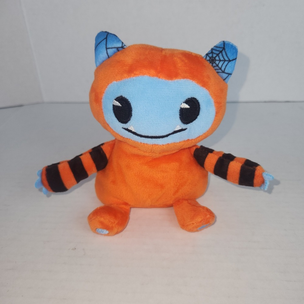 MTY International Orange Monster Plush Spiderweb Ears Striped Arms Stuffed Toy